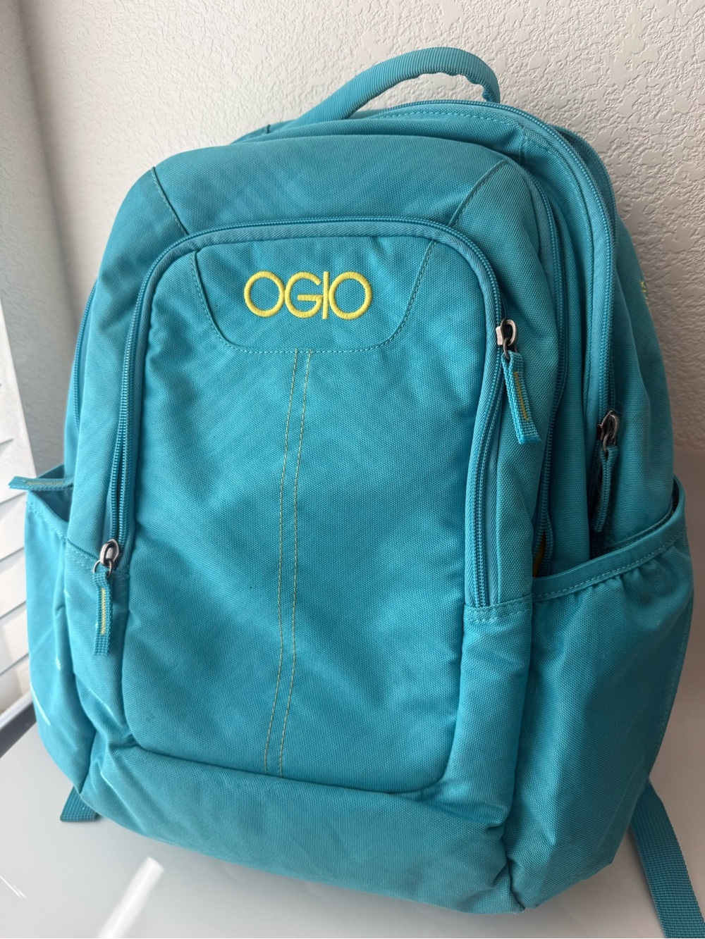 OGIO Aqua Blue Backpack with Yellow Logo